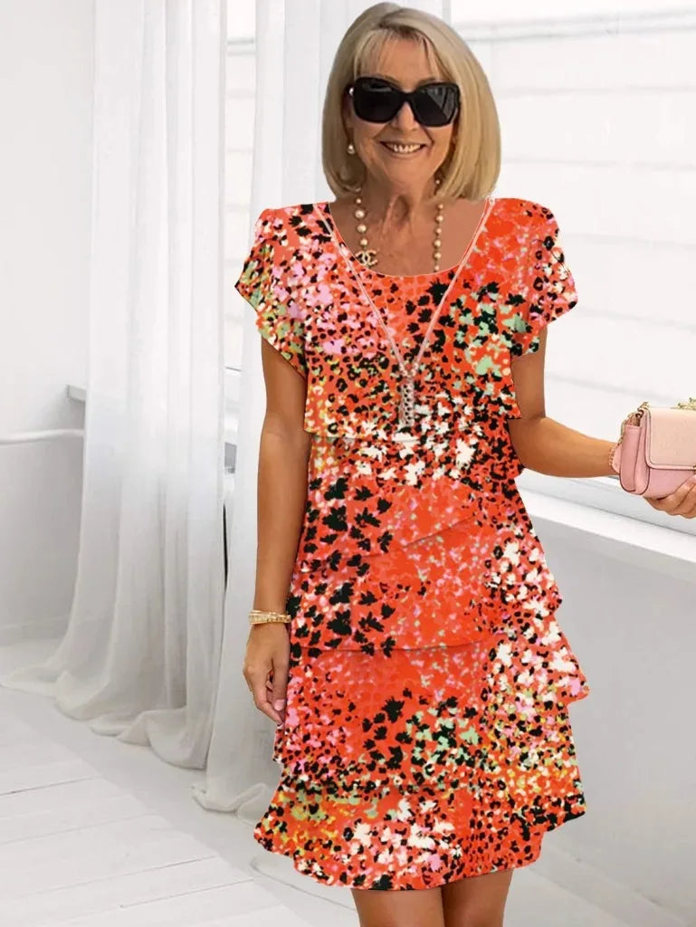 Clara |  Vestido elegante con volantes